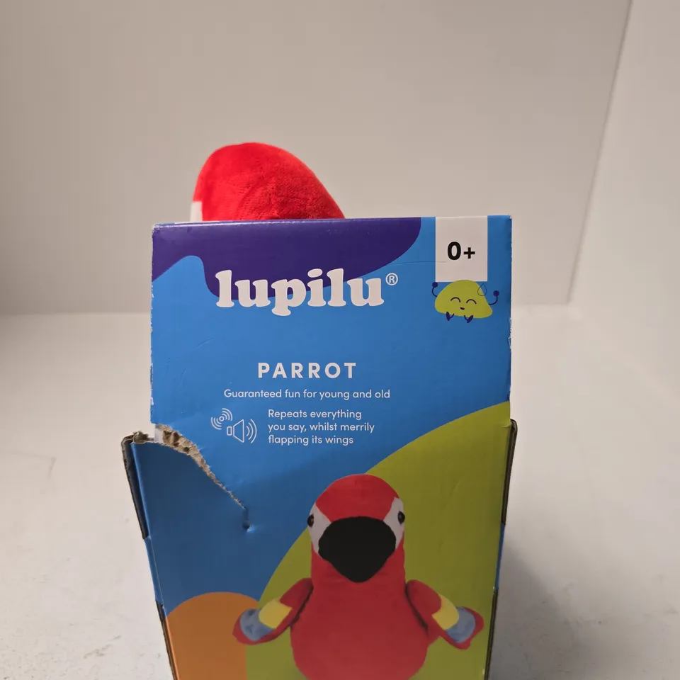 LUPILU PARROT PLUSH TOY – RED, IN BLUE BOX (0+) - REPEATS EVERYTHING YOU SAY