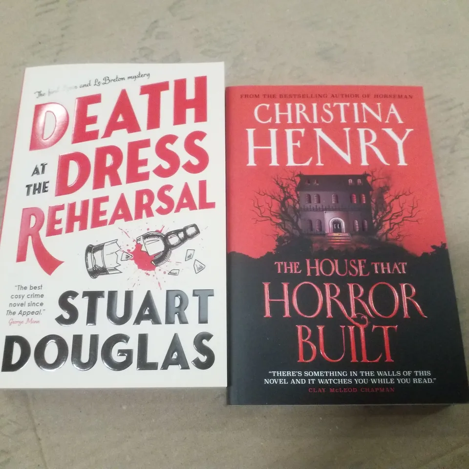 PALLET CONTAINING LARGE QUANTITY OF BOOKS INCLUDING DEATH AT THE DRESS REHEARSAL BY STUART DOUGLAS & THE HOUSE THAT HORROR BUILT BY CHRISTINA HENRY