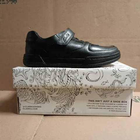 BOXED PAIR OF CLARKS KIDS VELCRO STRAP SHOES IN BLACK SIZE UK 12