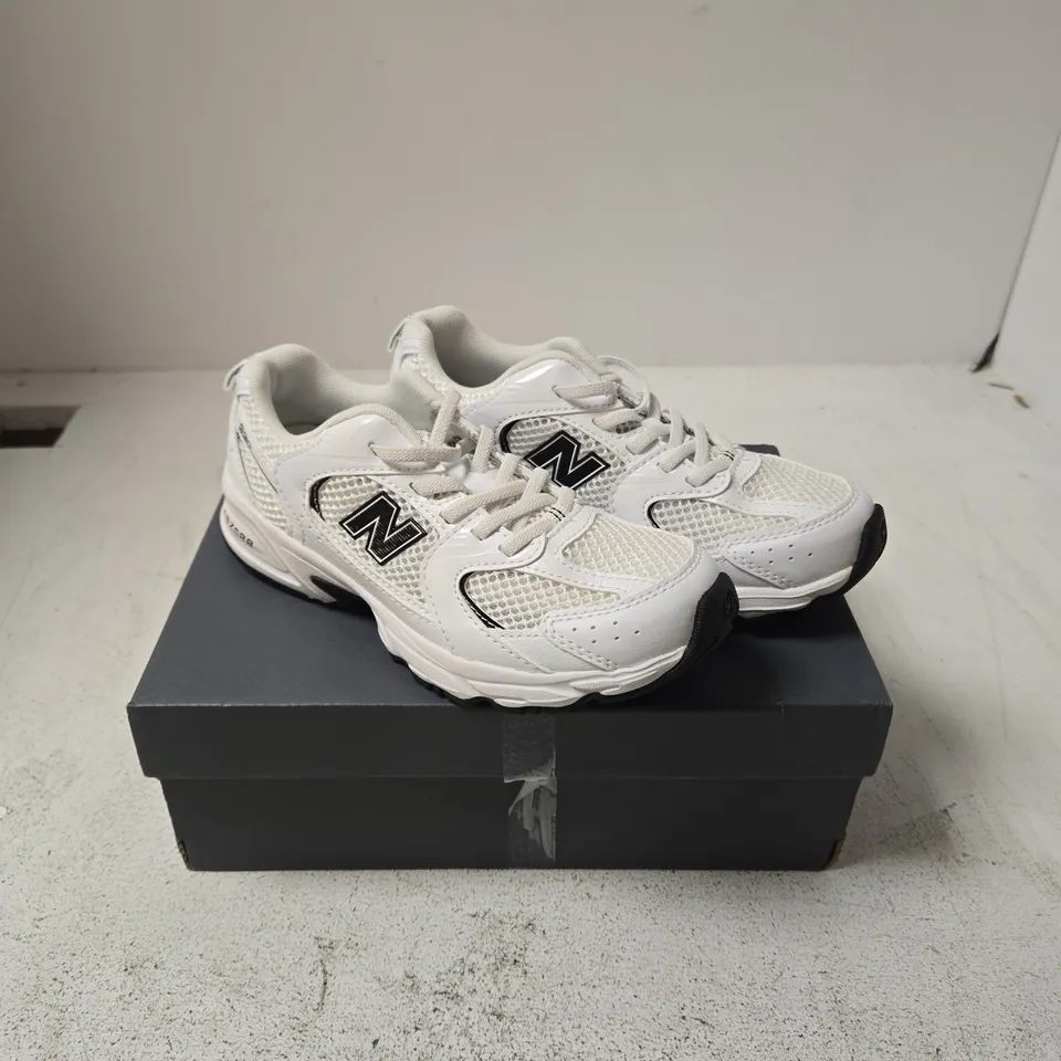 NEW BALANCE CHILDRENS WHITE TRAINERS - 33