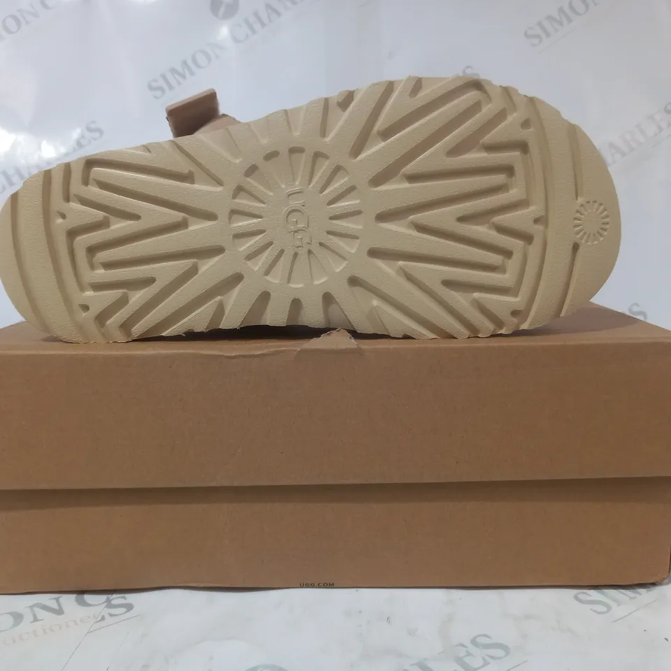 BOXED PAIR OF UGG GOLDENSTAR CLOGS IN BEIGE UK SIZE 7