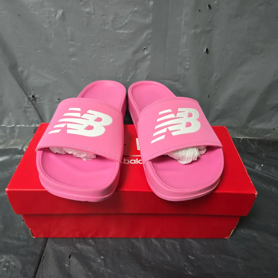 BOXED PAIR OF NEW BALANCE SLIDES IN PINK - UK 4