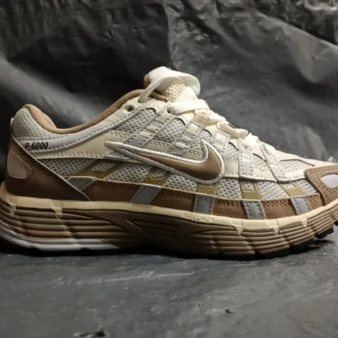 PAIR OF NIKE P-6000 TRAINERS IN TAN/BEIGE SIZE UK 4