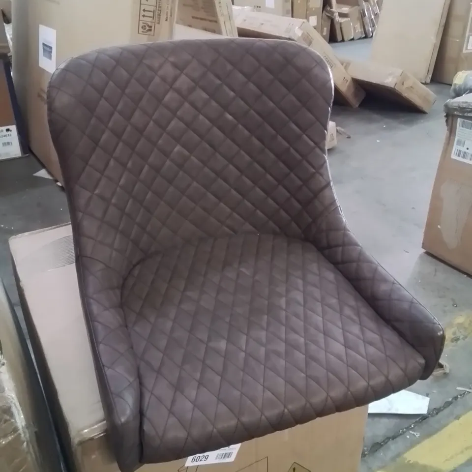 A BOXED PAIR OF BROWN FAUX LEATHER UPHOLSTERED SIDE/DINING CHAIRS