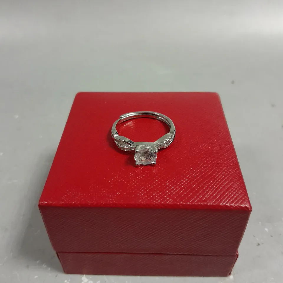 DESIGNER STONE TOPPED INFINITY RING 