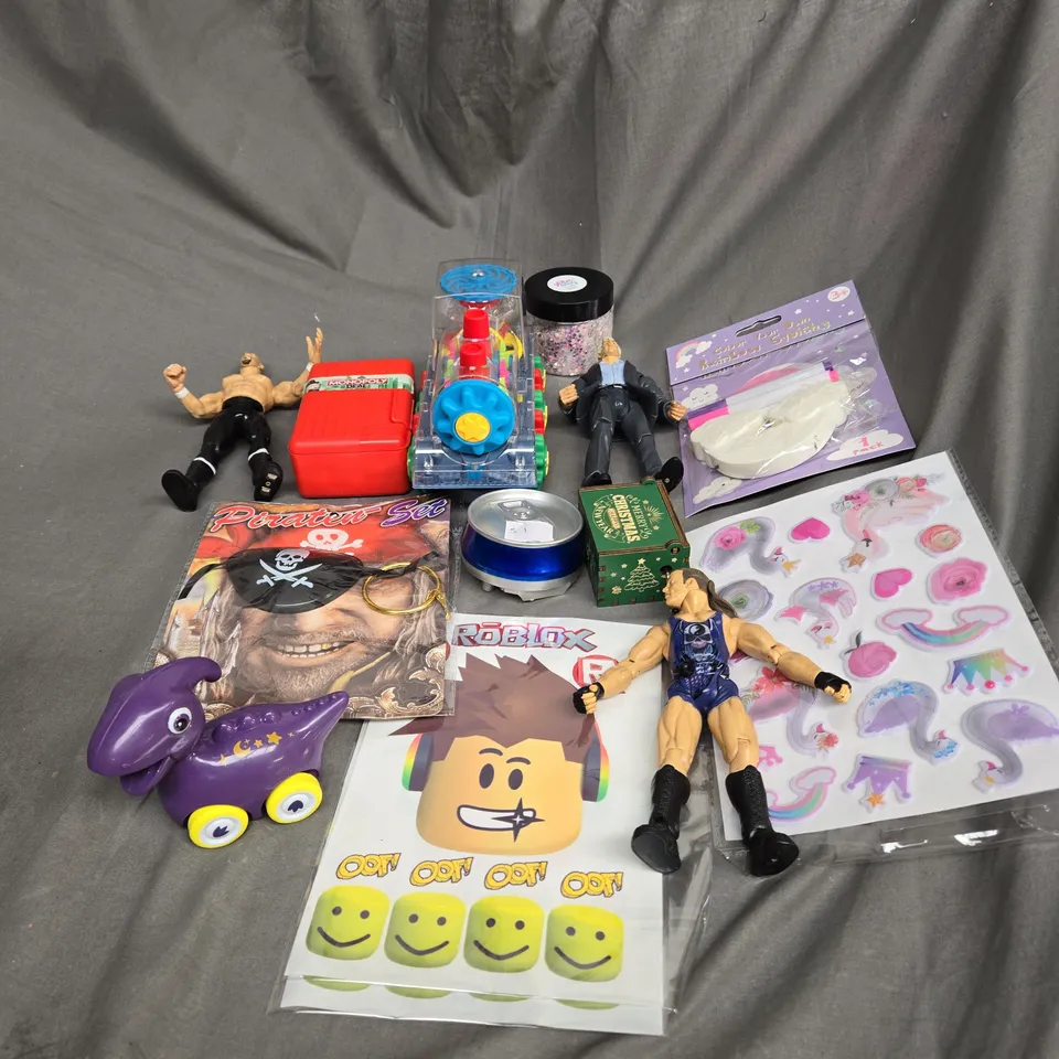 APPROXIMATELY 10 ASSORTED TOYS AND GAMES TO INCLUDE WRESTLING FIGURES, GLITTER AND MODEL CARS