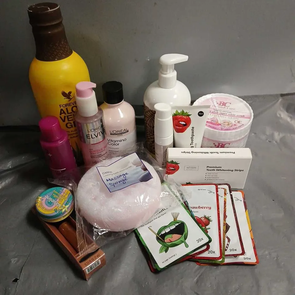 APPROXIMATELY 20 ASSORTED COSMETIC PRODUCTS INCLUDE - L'OREAL VITIMINO COLOUR SHAMPOO - L'OREAL GLYCOLIC GLOSS LEAVE IN SERUM - NIP+FAB SALICYLIX TONIC - ETC