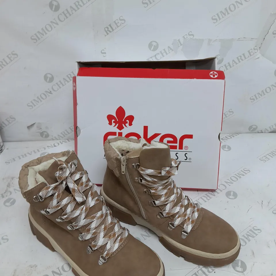 BOXED PAIR OF RIEKER LACE UP CHUNKY BOOTS IN CREAM SIZE 7