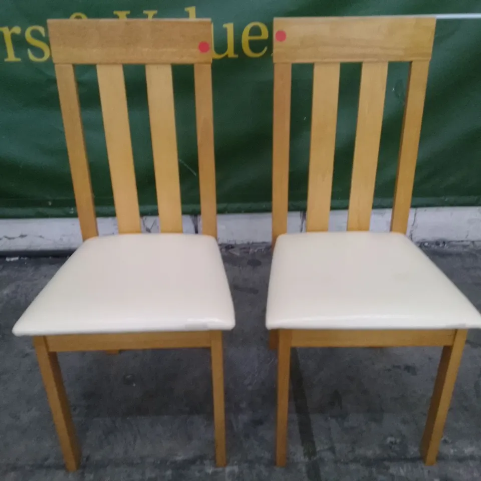 SET OF 2 NEW CHESTER OAK DINING CHAIRS (IVORY LEATHER SEAT PAD)