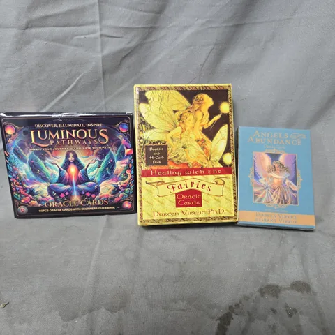 3 X NEW AGE/ORACLE CARD SETS INCLUDING ANGELS AND ABUNDANCE ORACLE SET, HEALING WITH THE FAIRIES ORACLE CARDS AND LUMINOUS PATHWAYS SET