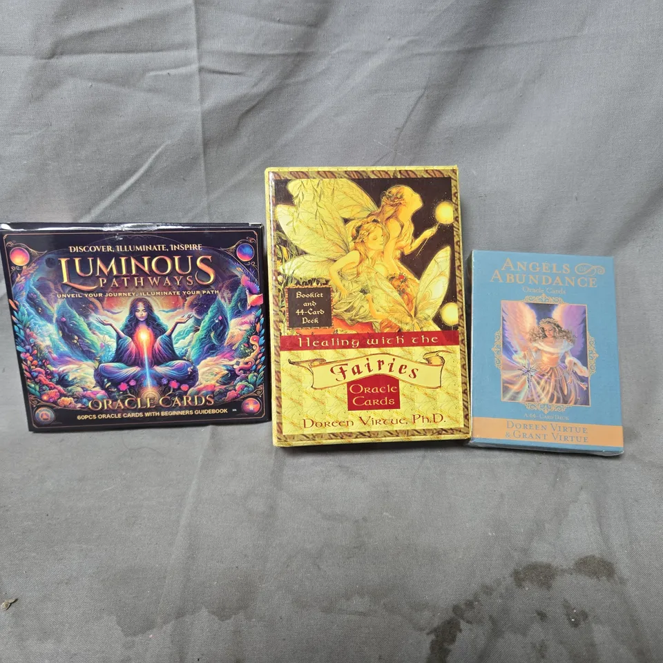 3 X NEW AGE/ORACLE CARD SETS INCLUDING ANGELS AND ABUNDANCE ORACLE SET, HEALING WITH THE FAIRIES ORACLE CARDS AND LUMINOUS PATHWAYS SET