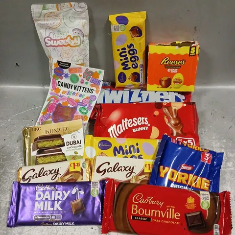 APPROXIMATELY 12 ASSORTED FOOD & DRINK ITEMS TO INCLUDE - CANDY KITTENS WILD & FREE - MALTEASERS BUNNY - KUNAFA DUBAI CHOCOLATE - ETC