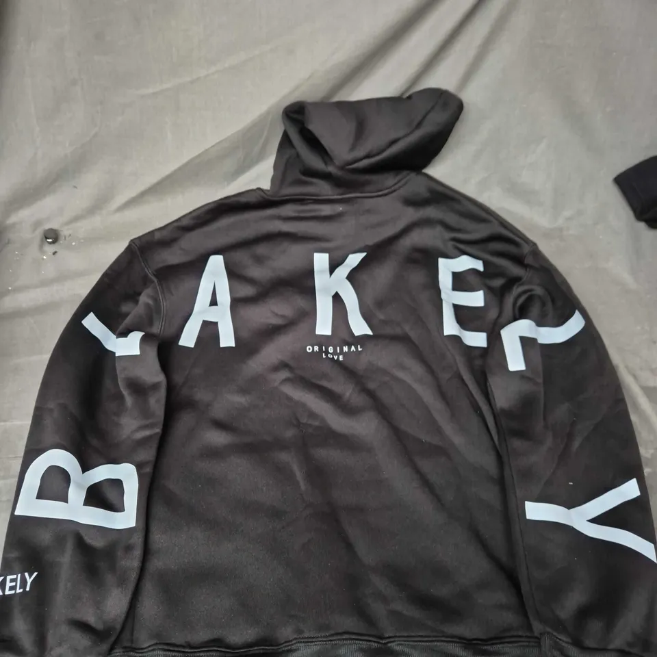 Black hoodie with large white letter graphics – Size S