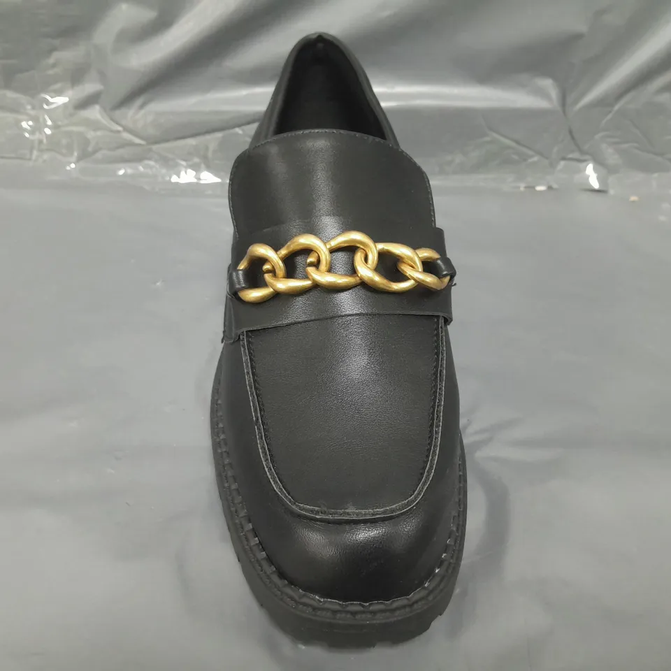 BOXED PAIR OF LONDON REBEL LOAFERS IN BLACK W. GOLD EFFECT CHAIN EU SIZE 38