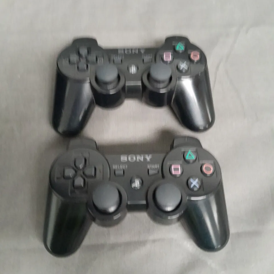 PLAYSTATION 3 GAME CONSOLE WITH 2 CONTROLLERS