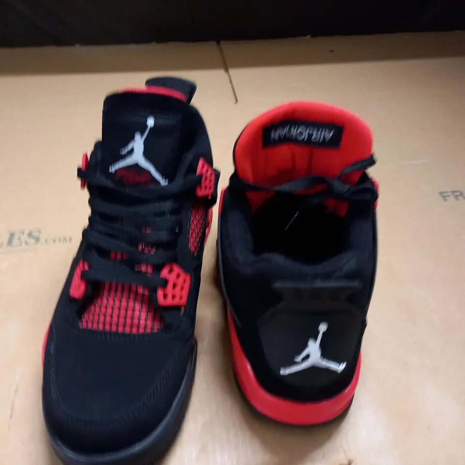 PAIR OF AIT JORDAN 4 RETRO TRAINERS IN BLACK/RED - UK 7