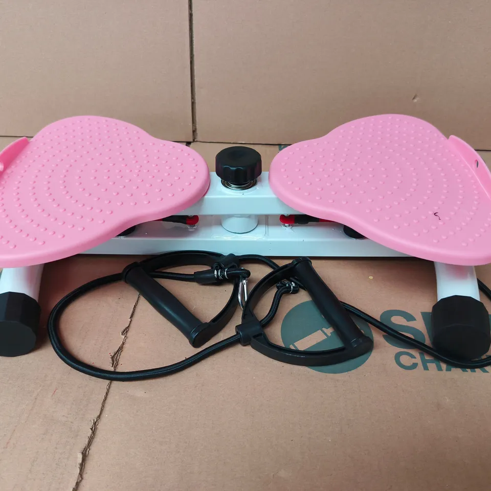 WAIST EXERCISING MACHINE IN PINK WITH TENSION ROPES