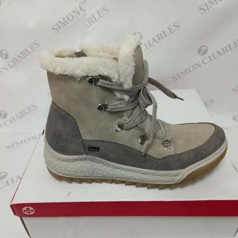 BOXED PAIR OF RIEKER ANTISTRESS WATER RESISTANT WARM HIKING BOOTS, CREAM - SIZE 6.5