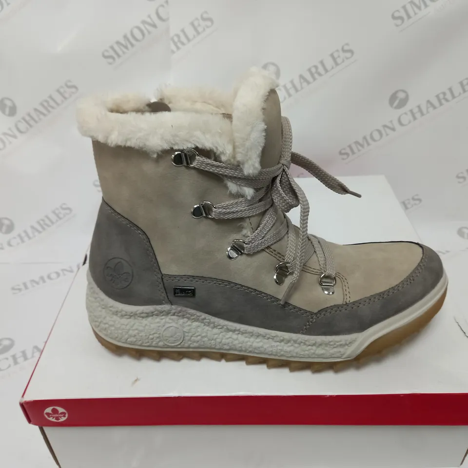 BOXED PAIR OF RIEKER ANTISTRESS WATER RESISTANT WARM HIKING BOOTS, CREAM - SIZE 6.5 