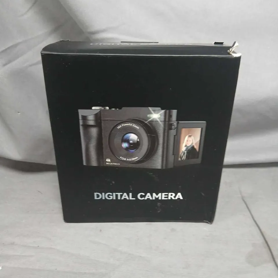 DIGITAL CAMERA – BLACK COMPACT WITH FLIP-OUT LCD, 16X ZOOM