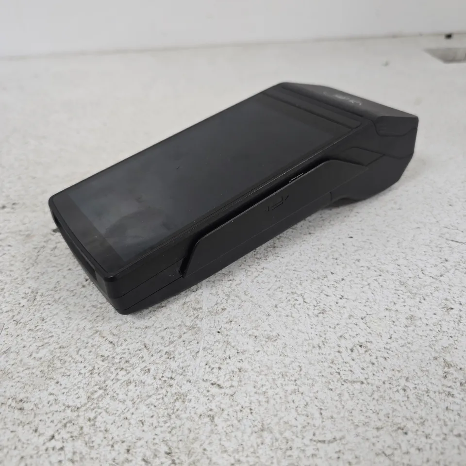 Black handheld card machine with display and card slot