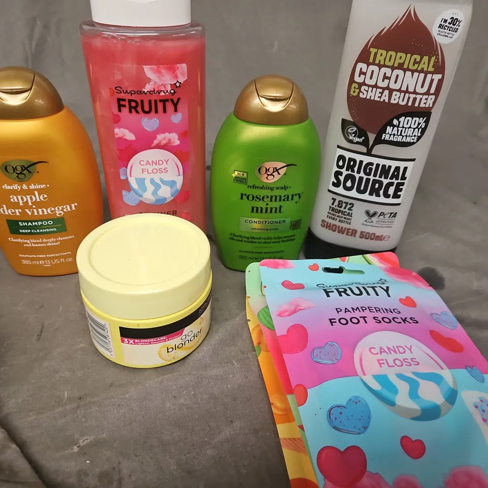 APPROXIMATEY 20 HEALTH AND BEAUTY PRODUCTS TO INCLUD - OGX - SHOWER GEL FOOT SOCKS- ETC