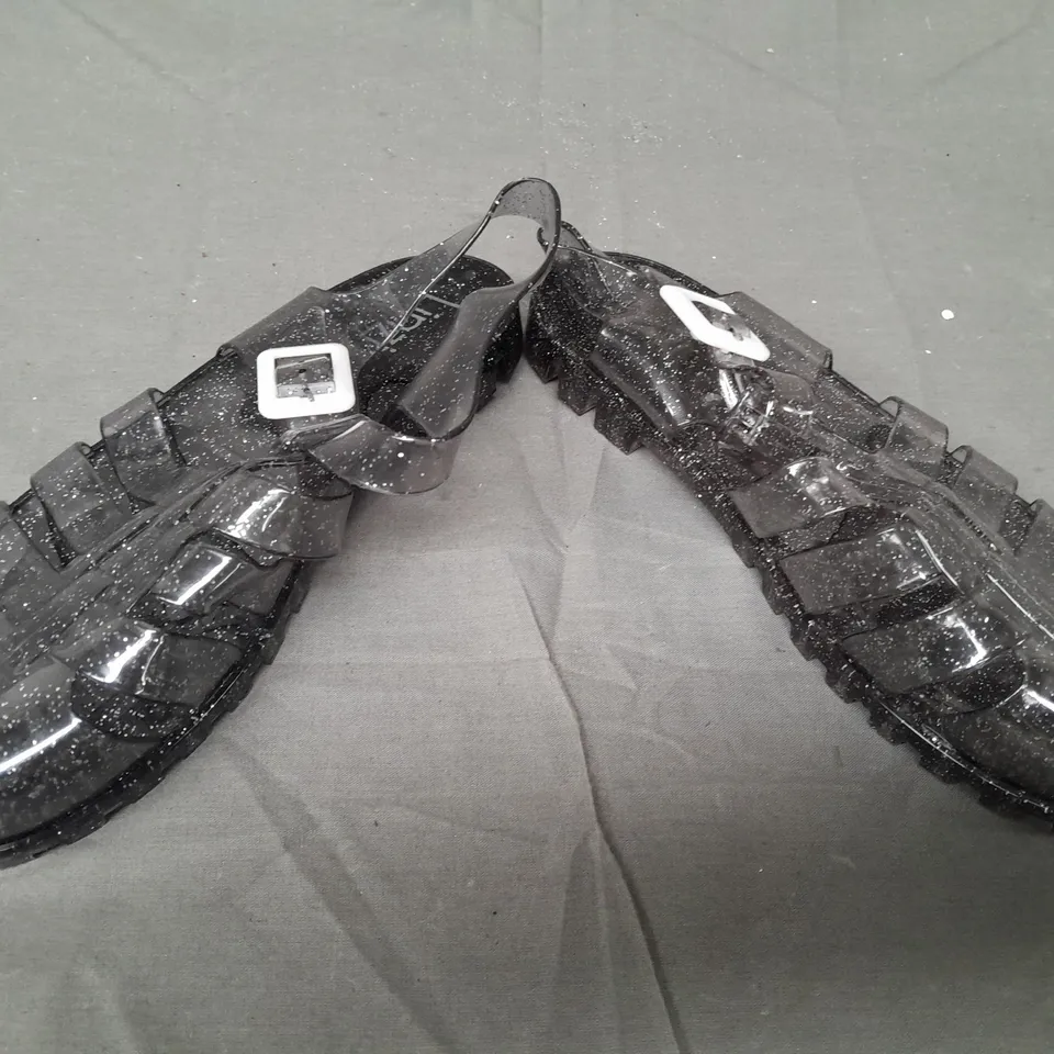 BOX OF APPROXIMATELY 20 PAIRS OF LINZI CLOSED TOE SANDALS IN TRANSPARENT BLACK W. GLITTER EFFECT - VARIOUS SIZES - COLLECTION ONLY