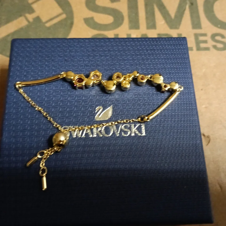 SWAROVSKI GOLD-TONE BRACELET WITH PINK AND CLEAR CRYSTALS – BOXED