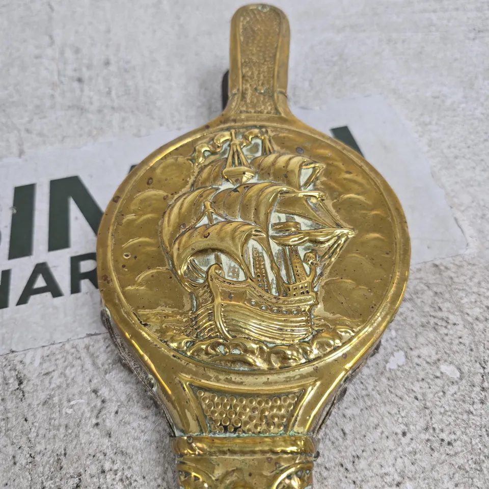VINTAGE EMBOSSED BRASS AND WOOD FIRE BELLOWS WITH SHIP DESIGN