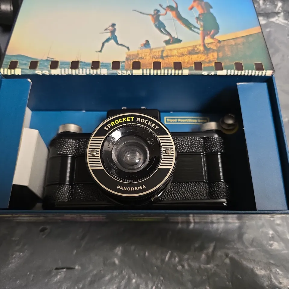 LOMOGRAPHY SPROCKET ROCKET PANORAMA CAMERA – BOXED