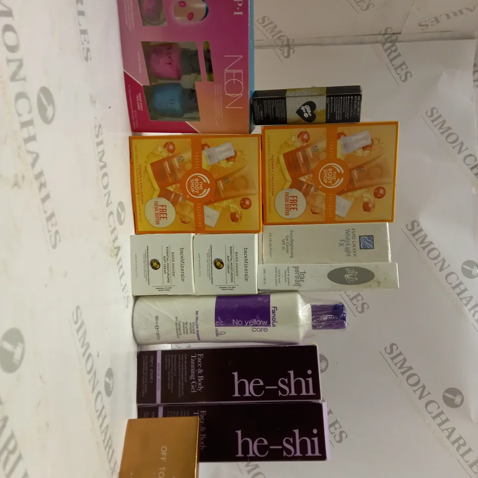 LOT OF APPROX 10 TO INCLUDE ESTEE LAUDER WHITE LIGHT EX , FANOLA NO YELLOW SHAMPOO , ETC
