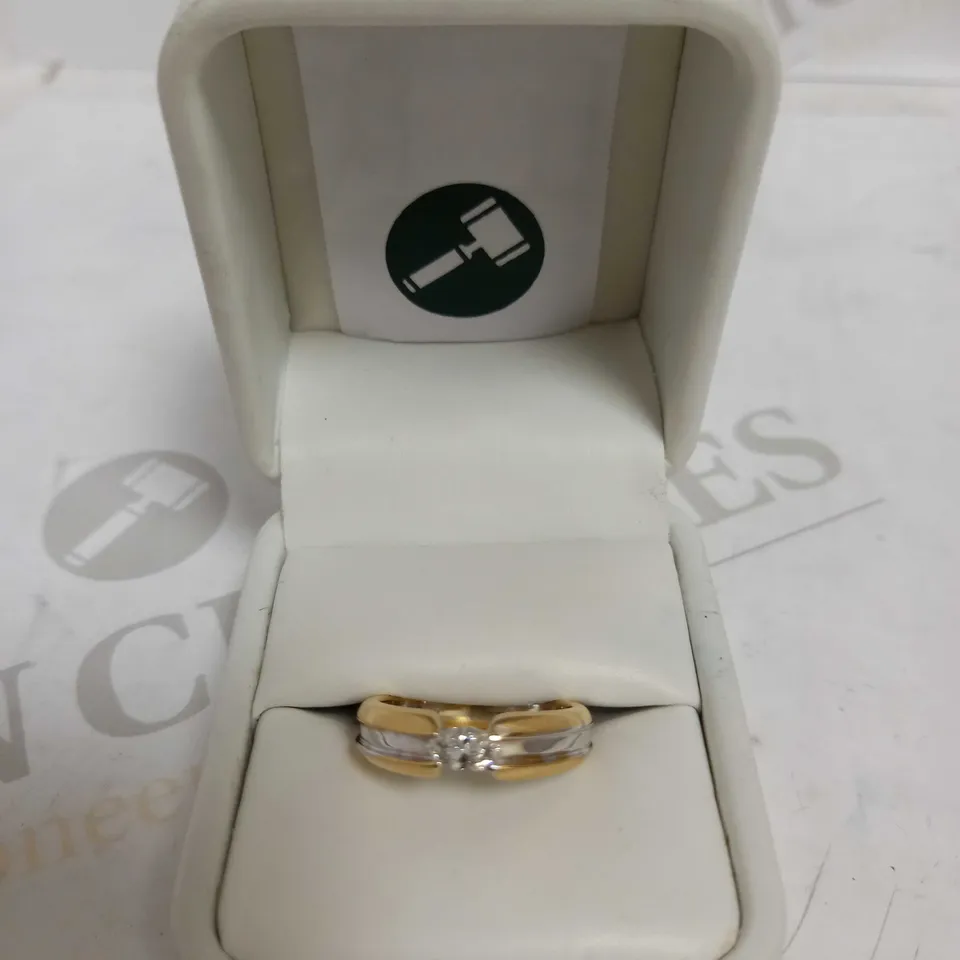 DESIGNER 18CT GOLD SOLITAIRE RING TENSION-SET WITH A MARQUISE CUT DIAMOND