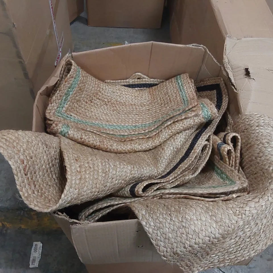 BOX CONTAINING A LARGE ASSORTMENT OF DESIGNER JUTE RUGS AND UNTESTED LAMPS