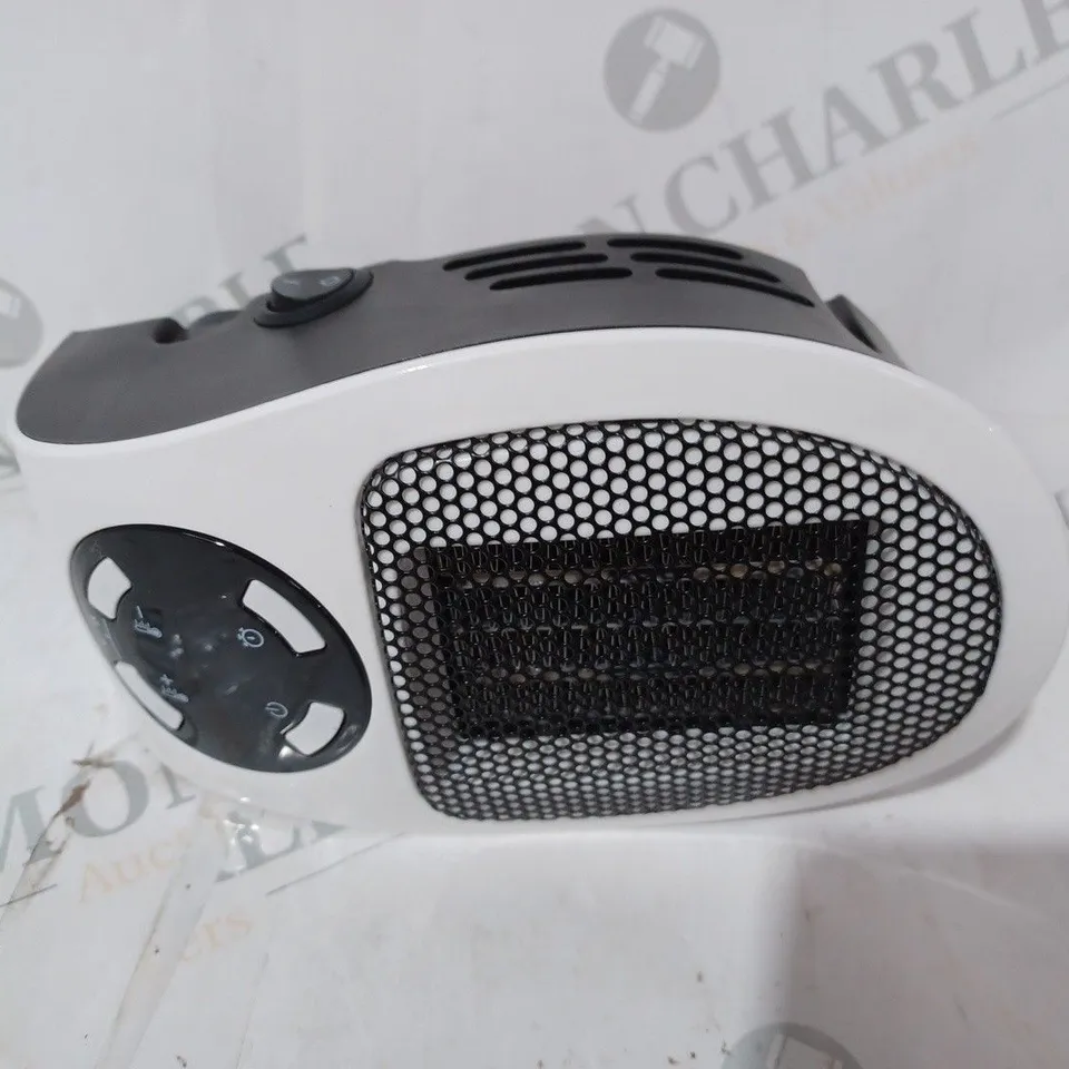 BOXED DAEWOO 500W DIGITAL PTC PLUG-IN HEATER