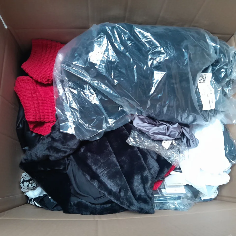 LARGE QAUNTIITY OF ASSORTED CLOTHES IN VARIOUS COLORS AND SIZES TO INCUDED DRESSES, T-SHIRTS , TROUSERS 