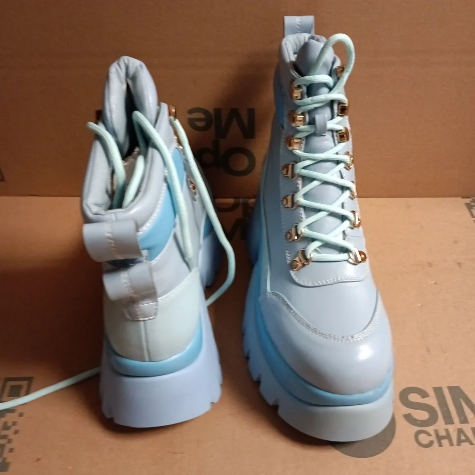 BOXED PAIR OF KOI CRYBABY BLUE VILUN PLATOFORM  BOOTS - UK 6