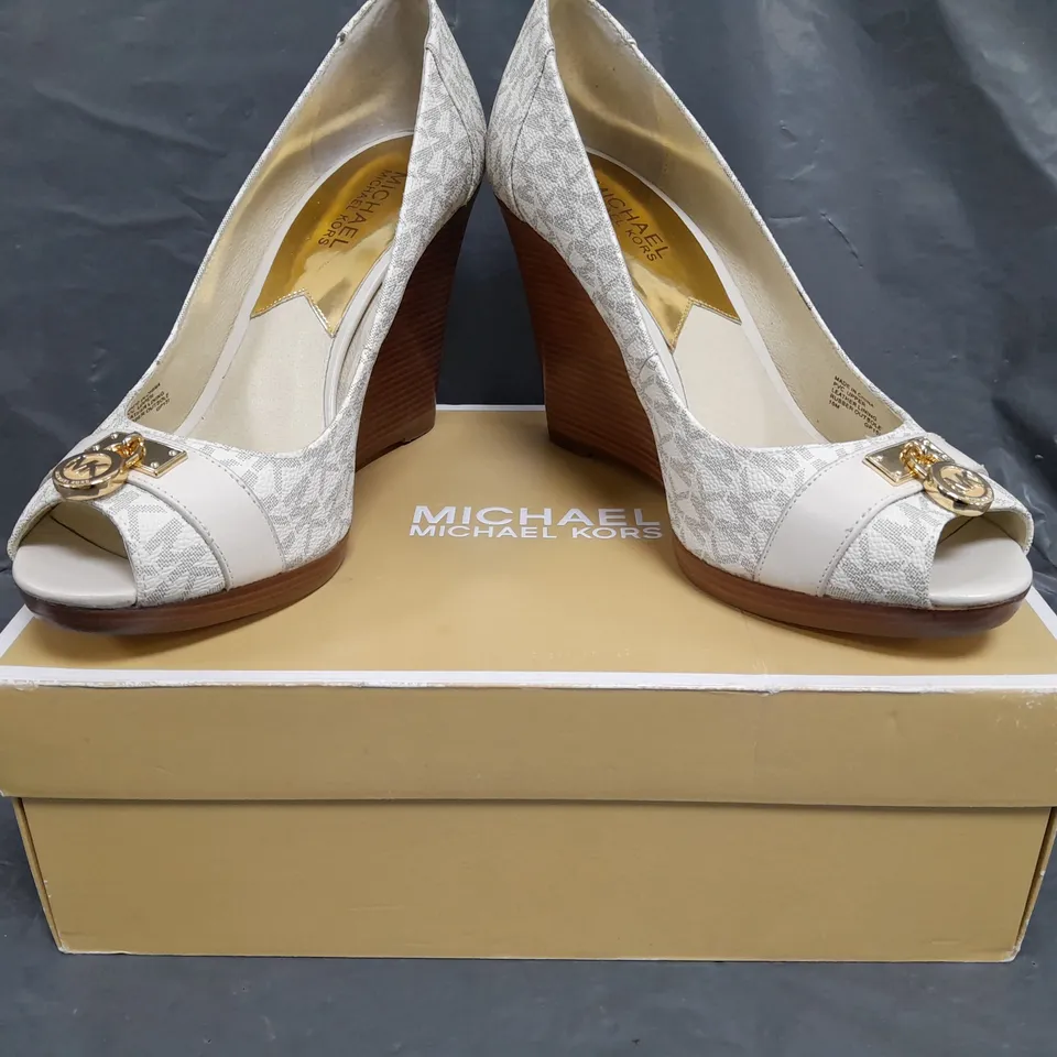 BOXED PAIR OF MICHAEL KORS HAMILTON WEDGE SHOES IN CREAM SIZE EU 41