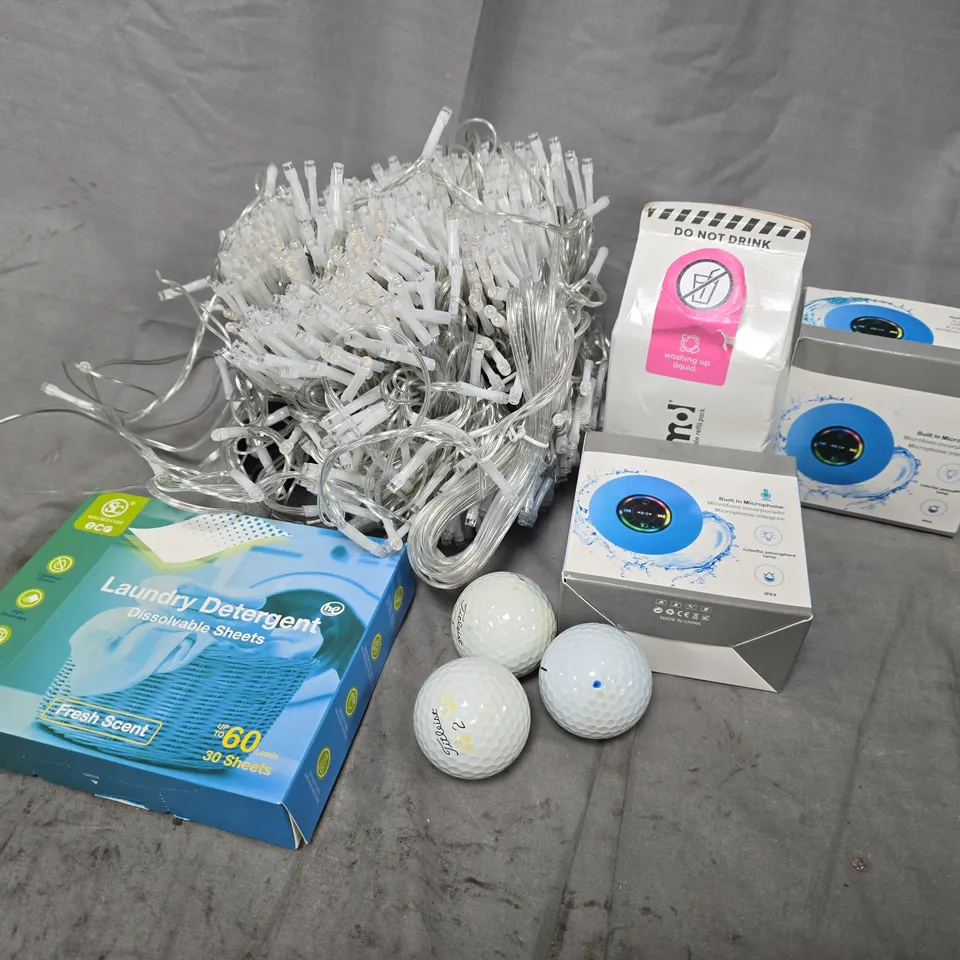 APPROXIMATELY 15 ASSORTED HOUSEHOLD ITEMS TO INCLUDE DISSOLVE-ABLE SHEETS, STRING LIGHTS, TITLEIST GOLD BALLS, ETC