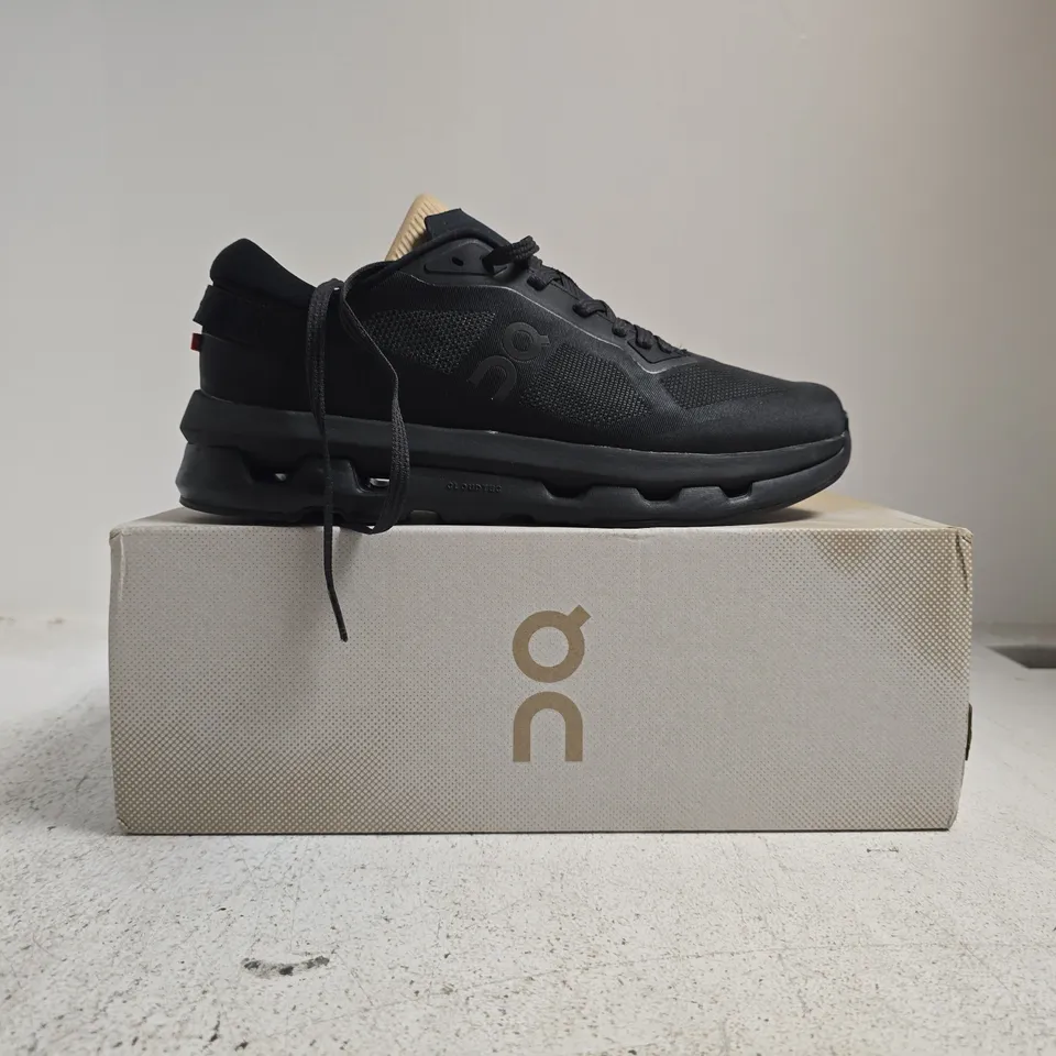 BOXED PAIR OF ON CLOUDZONE TRAINERS IN BLACK SIZE UK 8