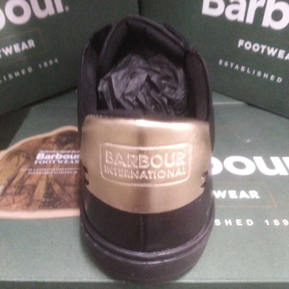 BRAND NEW BOXED BARBOUR INTERNATIONAL HERRERA BLACK AND GOLD SIZE 6