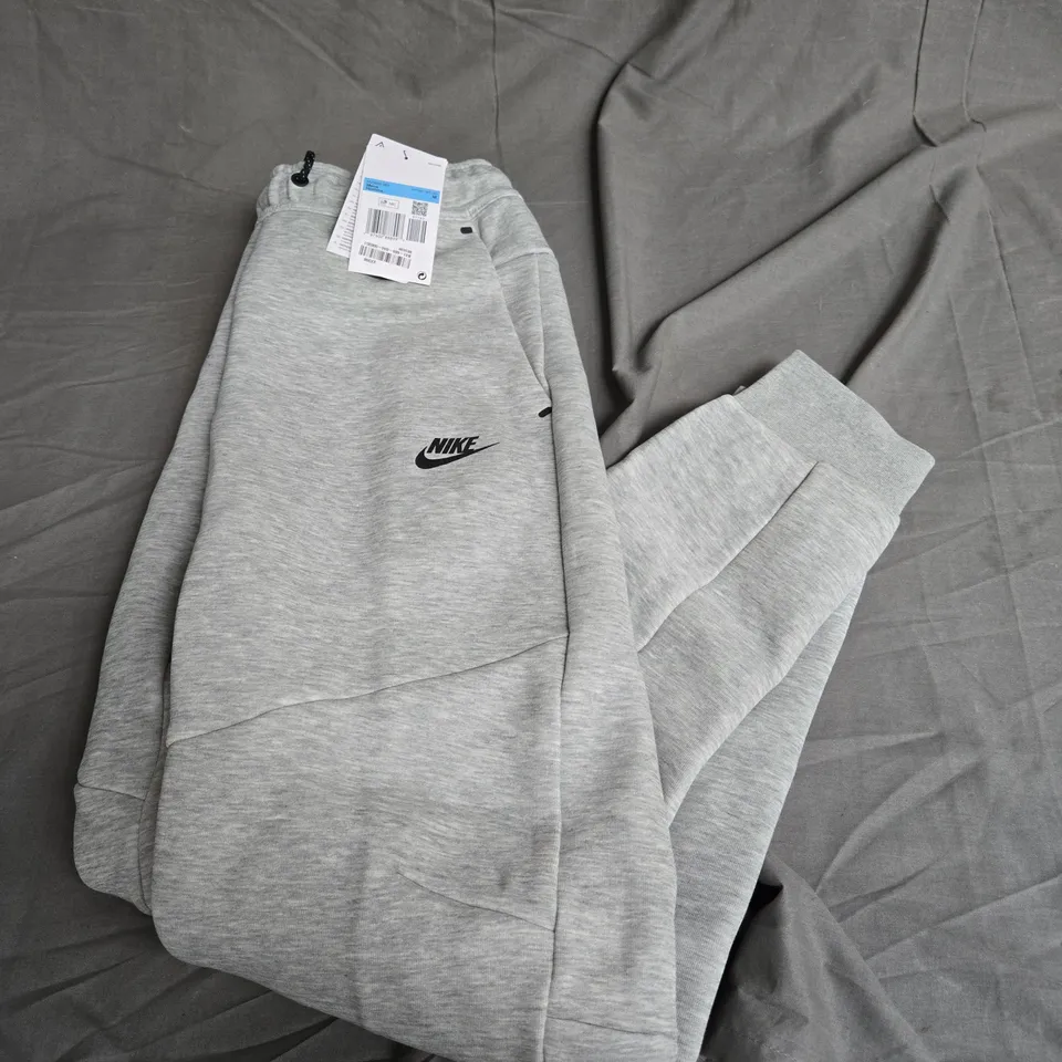 NIKE MEDIUM GREY TECH JOGGERS 