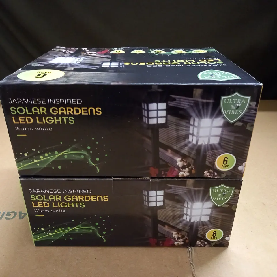 LOT OF 2 6-PACK BOXES OF JAPANESE INSPIRED SOLAR GARDEN LED LIGHTS