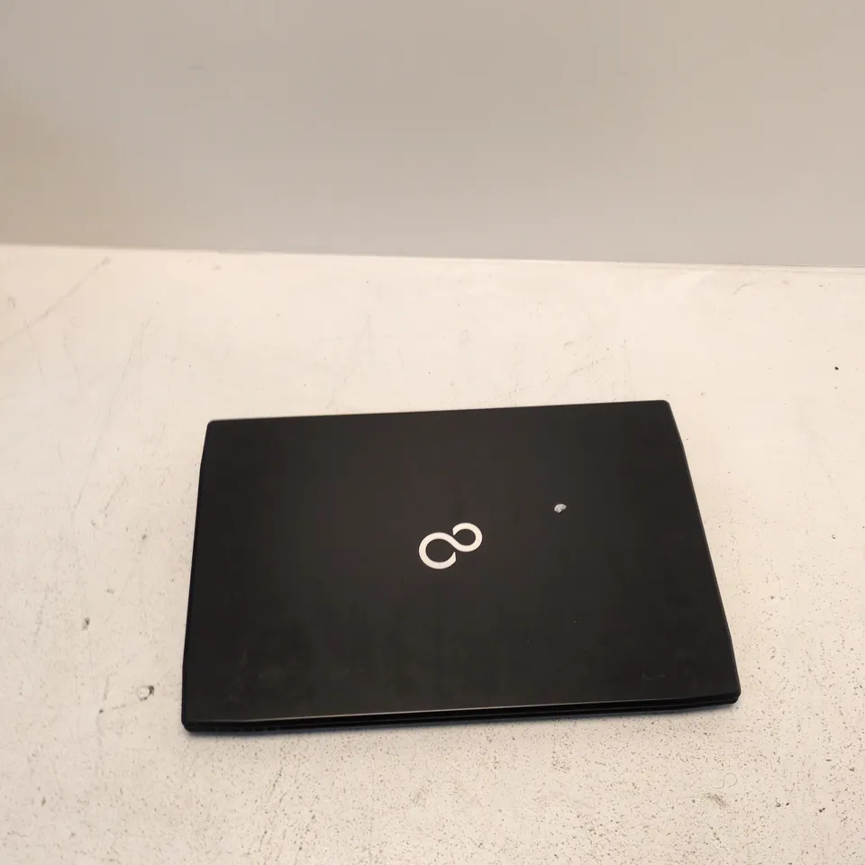 FUJITSU LIFEBOOK A544 LAPTOP – BLACK, UNTESTED, FAULTY (MISSING KEYCAPS)