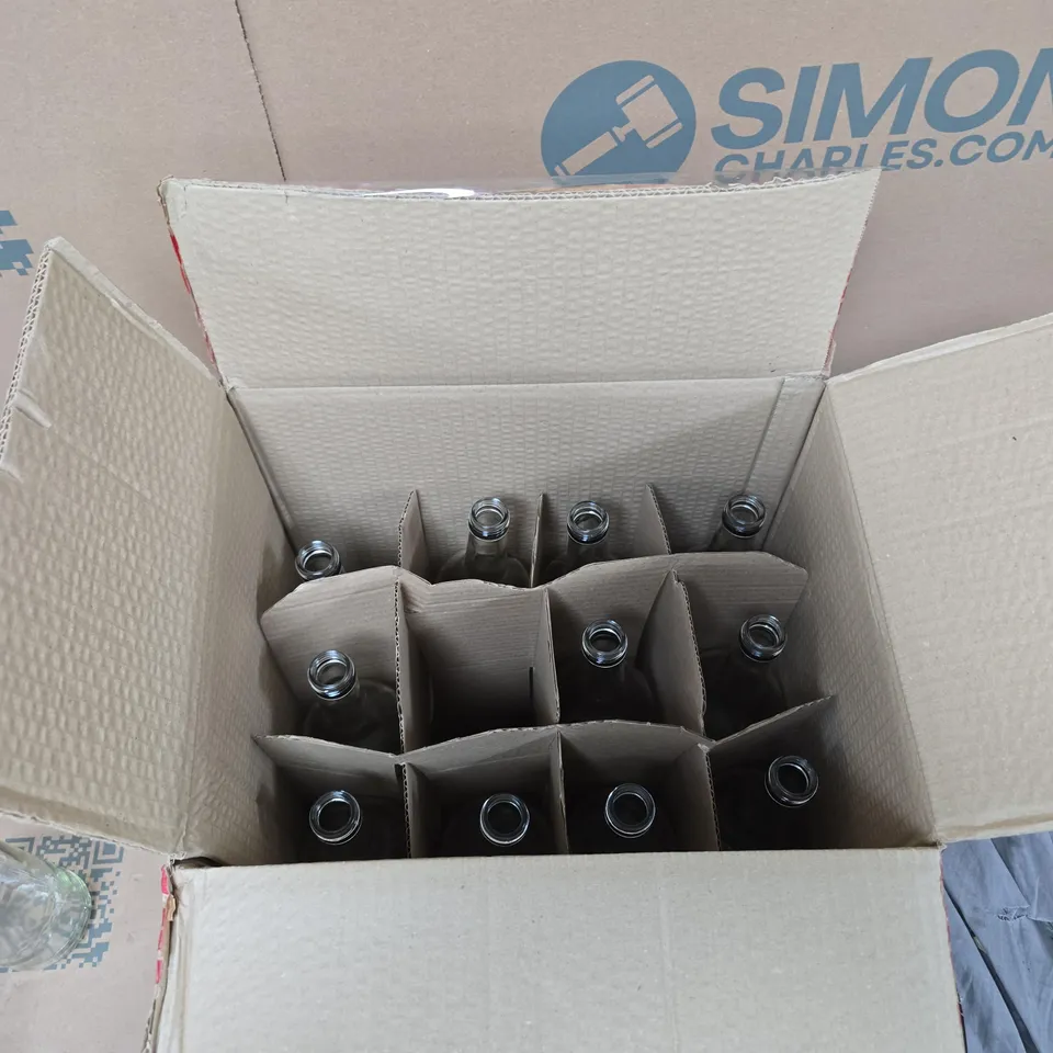 BOX OF 12 PLAIN GLASS BOTTLES WITH PLAIN BLACK LIDS 