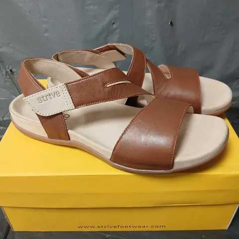 BOXED PAIR OF STRIVE JINNY SANDALS IN TAN - UK 7