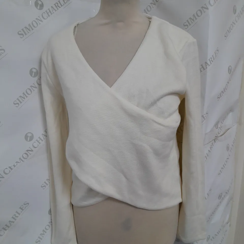 ZARA CROSS JUMPER IN CREAM SIZE M