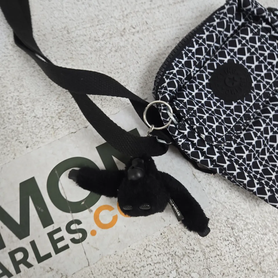 KIPLING CROSSBODY BAG WITH MONKEY CHARM – BLACK/WHITE GEOMETRIC PATTERN
