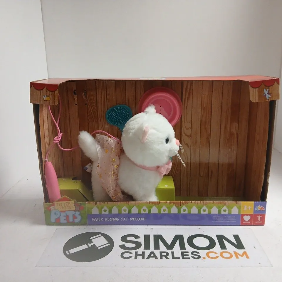 WALK ALONG CAT DELUXE PLUSH TOY – WHITE CAT WITH PINK ACCENTS (BOXED)