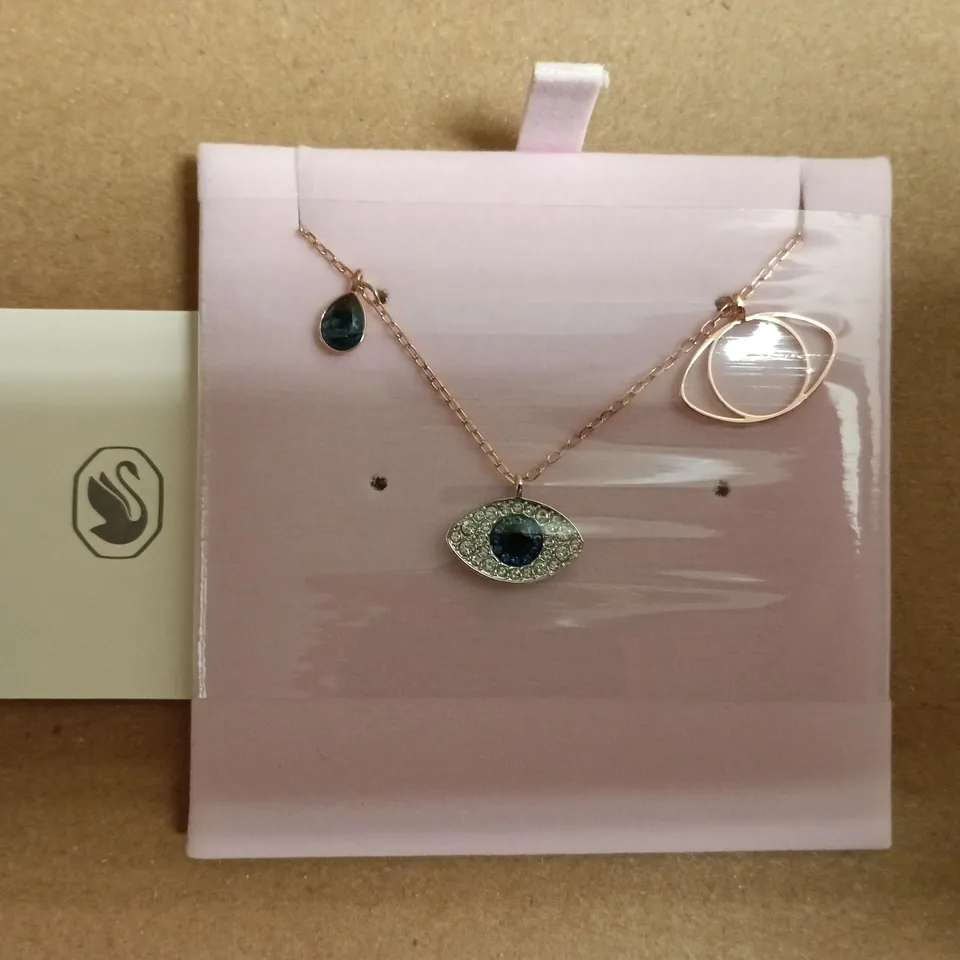 SWAROVSKI SYMBOLIC PENDANT FEATURING AN EVIL EYE MOTIF