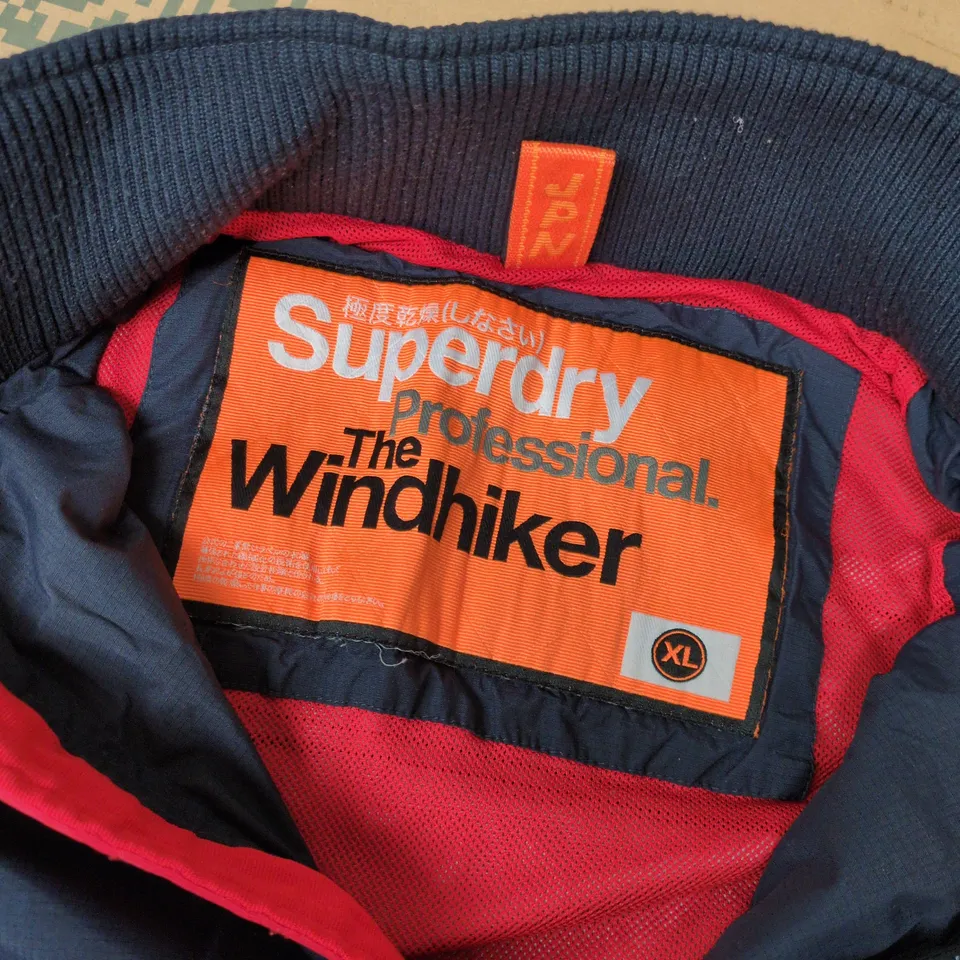 SUPERDRY THE WINDHIKER WINDBREAKER JACKET IN NAVY – UK XL